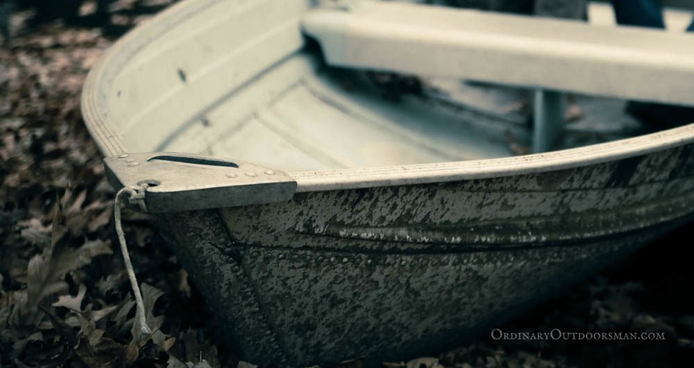 photo of jon boat with the words, "An ordinary outdoorsman doesn't mind fishing from the Sears jon boat he inherited from grandpa."