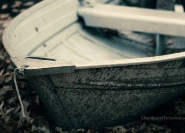 photo of jon boat with the words, "An ordinary outdoorsman doesn't mind fishing from the Sears jon boat he inherited from grandpa."