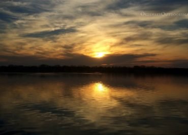 photo of a lake at sunset with the caption, "5 steps to prepare for the fishing season