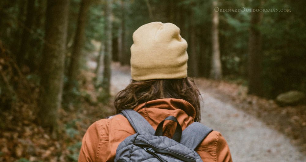 photo of a hiker with the caption: 10 tips for hiking in the Rocky Mountains