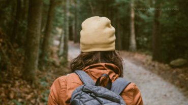 photo of a hiker with the caption: 10 tips for hiking in the Rocky Mountains