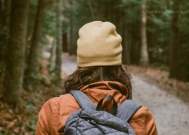 photo of a hiker with the caption: 10 tips for hiking in the Rocky Mountains