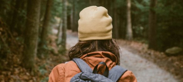 photo of a hiker with the caption: 10 tips for hiking in the Rocky Mountains