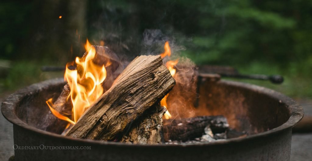 photo of campfire in a fire ring for article - 4 Camp Cooking tips and tricks