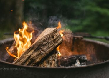 photo of campfire in a fire ring for article - 4 Camp Cooking tips and tricks