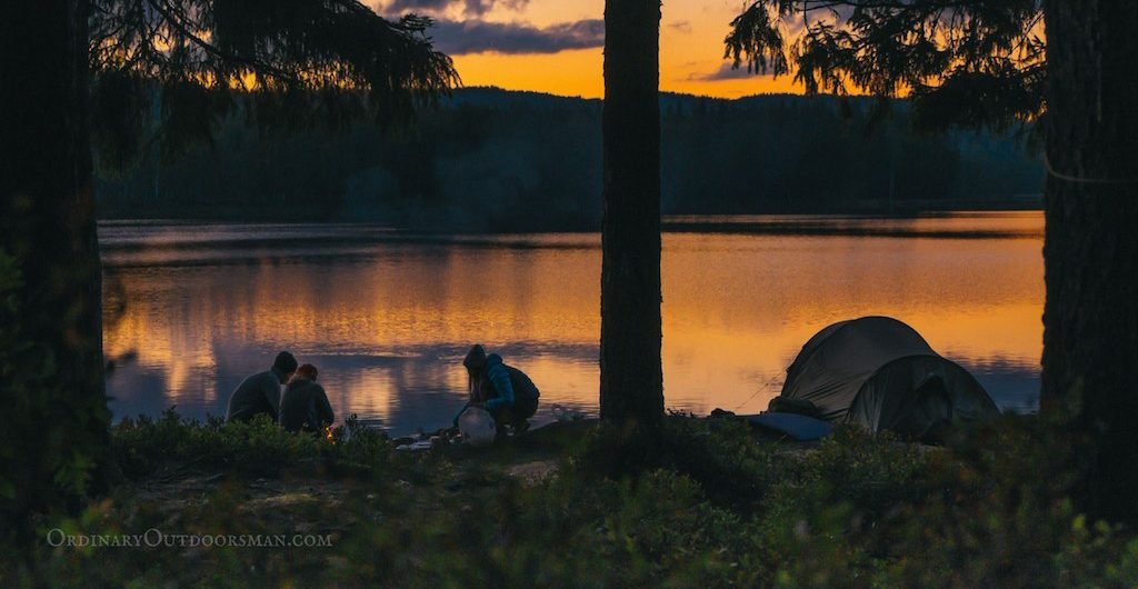 Photos at sunset of family camping demonstrating Essential Camping Gear for Families