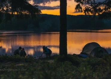 Photos at sunset of family camping demonstrating Essential Camping Gear for Families